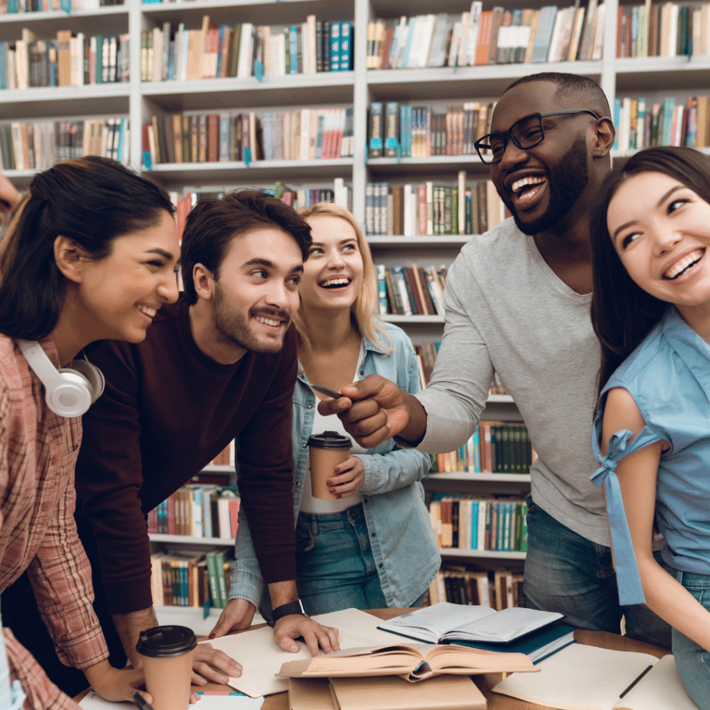 Why small talk matters — students chatting in a library study group.