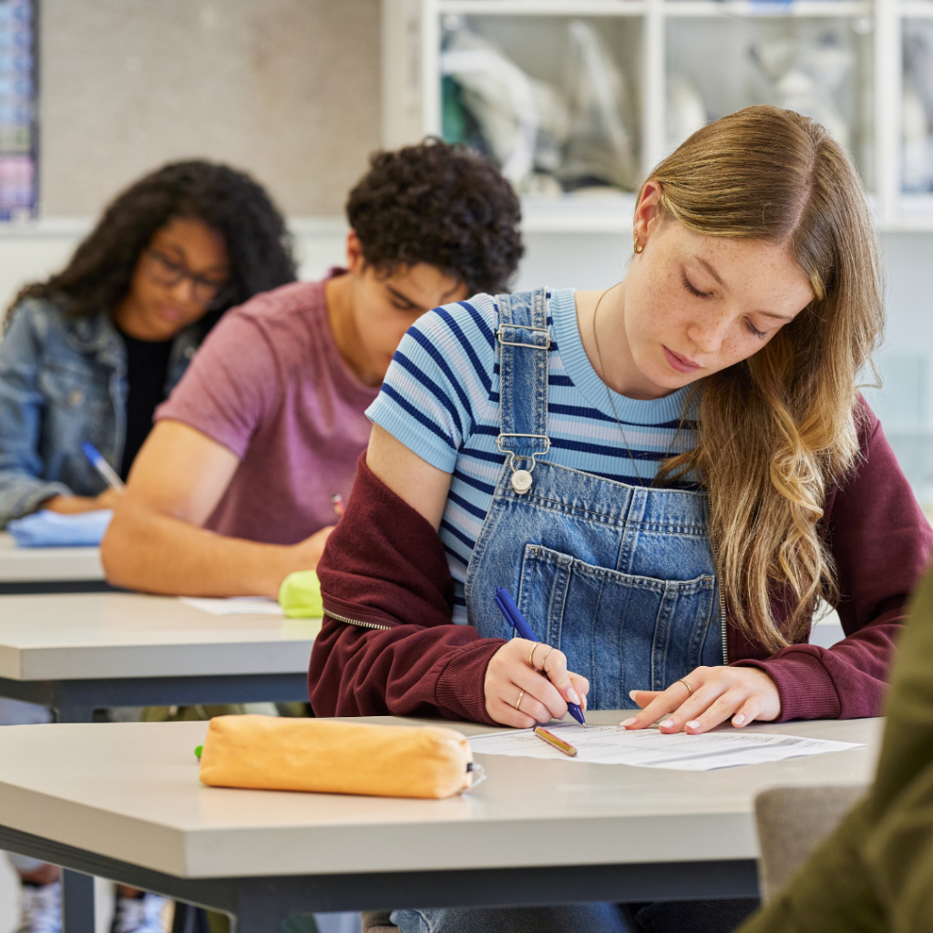Students taking an English exam in a certification-oriented test preparation class